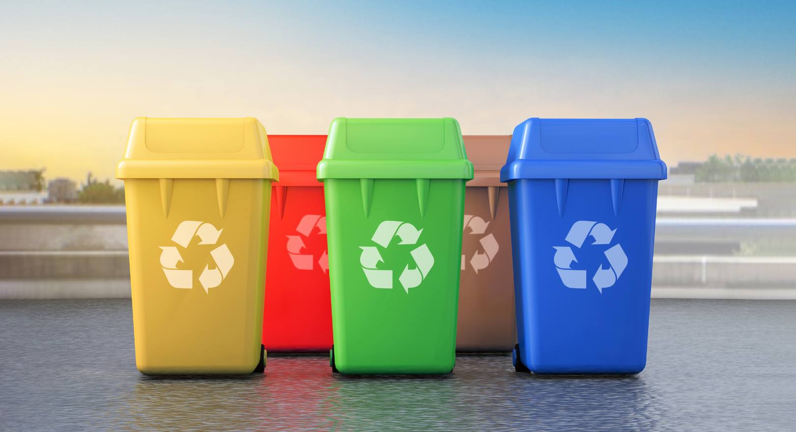 pojemniki w różnych kolorach do sortowania odpadów